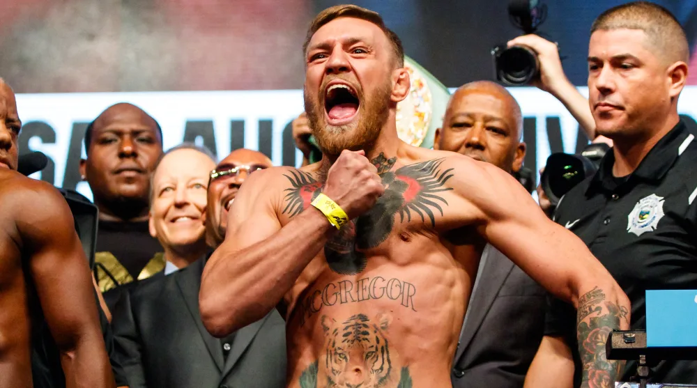 Conor McGregor Dustin Poirier galen UFC MMA Frontkick Online